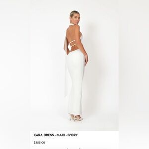 Tags on khanums white dress